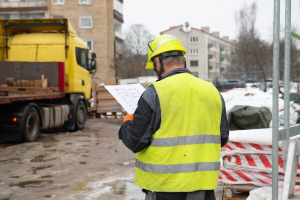 Construction manager working on building site