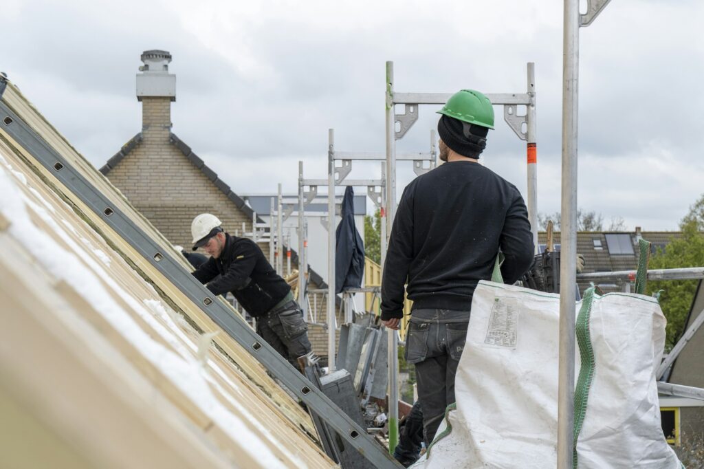 Roofing team working at height